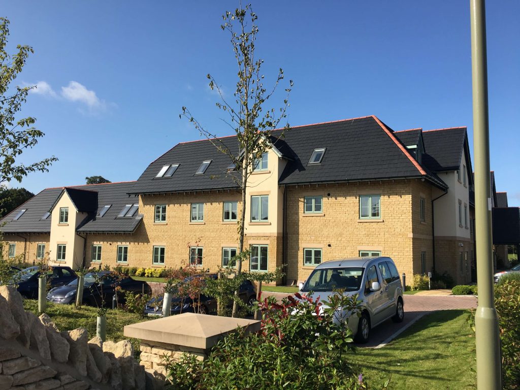 new care home tile and single ply